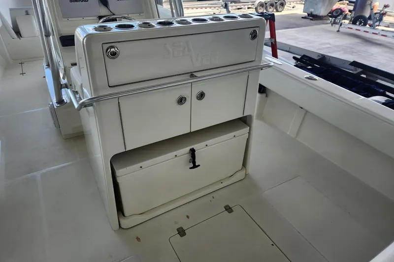  Yacht Photos Pics 2012 SeaVee 340B boat interior with storage compartments and rod holders.