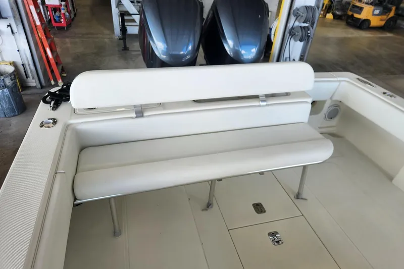  Yacht Photos Pics 2012 SeaVee 340B boat interior with white seating and storage compartments.