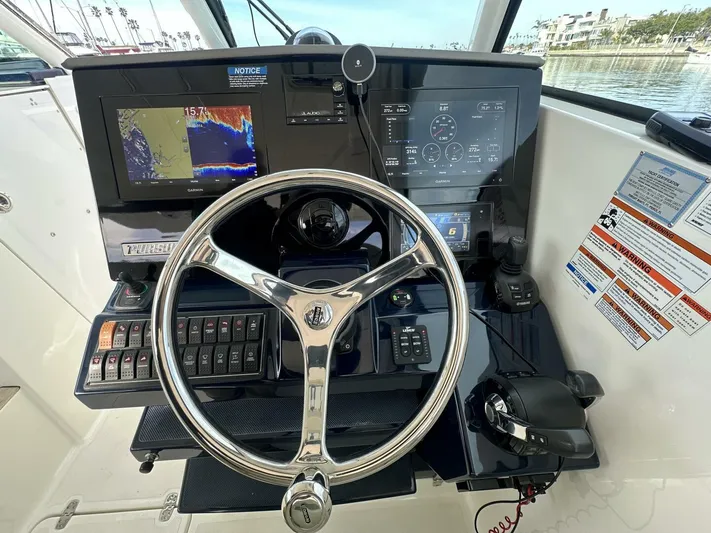 Always Grateful 2 Yacht Photos Pics 2021 Pursuit DC 326 Dual Console helm with advanced navigation and control systems.