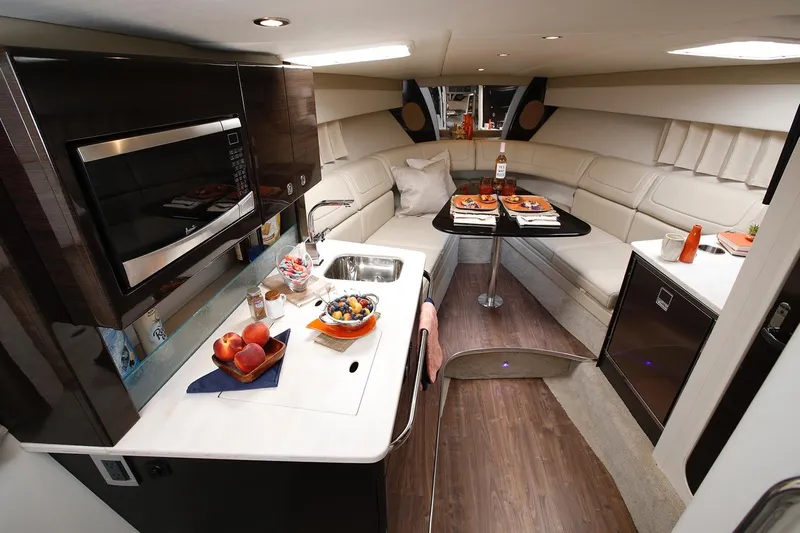  Yacht Photos Pics Manufacturer Provided Image: Interior of 2020 Formula 350 Sun Sport yacht with kitchen and dining area.