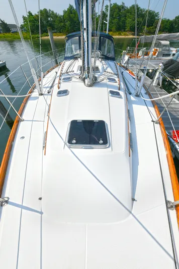 The Verdict III Yacht Photos Pics 2002 Sabre 452 sailboat deck with rigging and wooden trim.