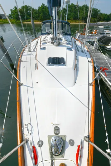 The Verdict III Yacht Photos Pics 2002 Sabre 452 sailboat deck view, docked in marina.