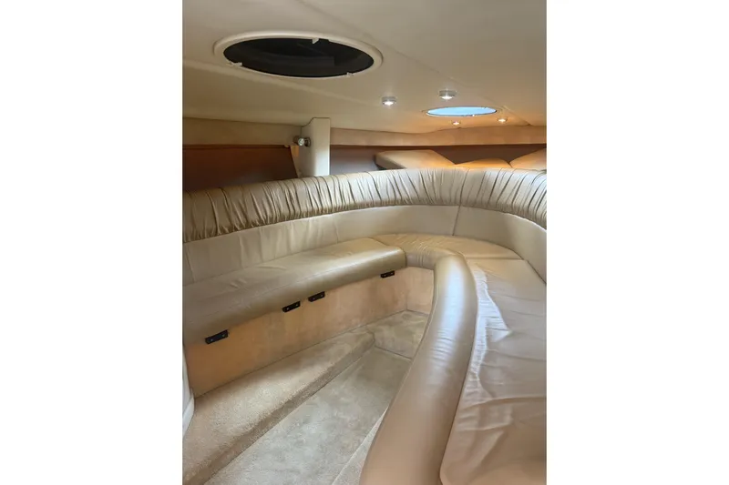  Yacht Photos Pics Luxurious interior of a 2007 Cobalt 343 boat with plush seating and ambient lighting.