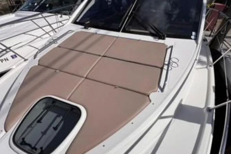  Yacht Photos Pics 2016 Sea Ray 400 Sundancer yacht with sunpad on deck, showcasing luxury design.