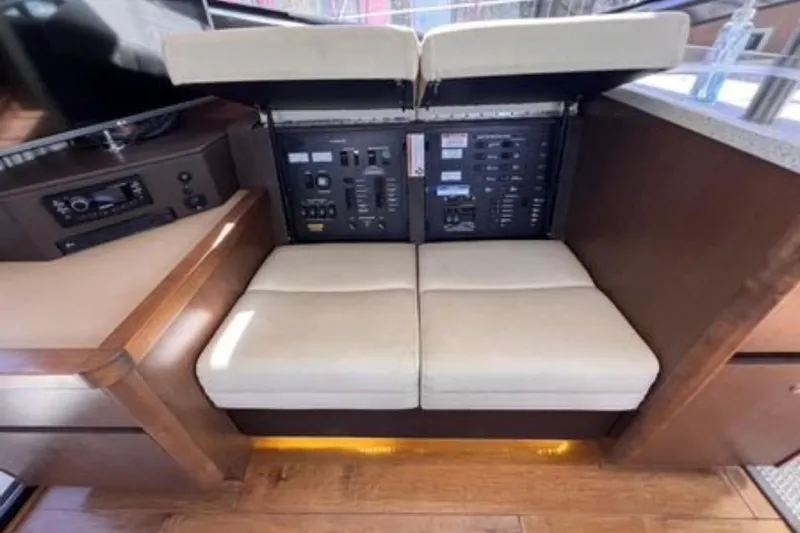  Yacht Photos Pics Interior view of 2016 Sea Ray 400 Sundancer yacht control panel and seating.