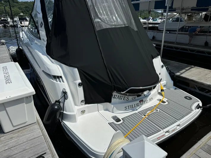  Yacht Photos Pics 2019 Monterey 335 SY boat docked with black cover, rear view.