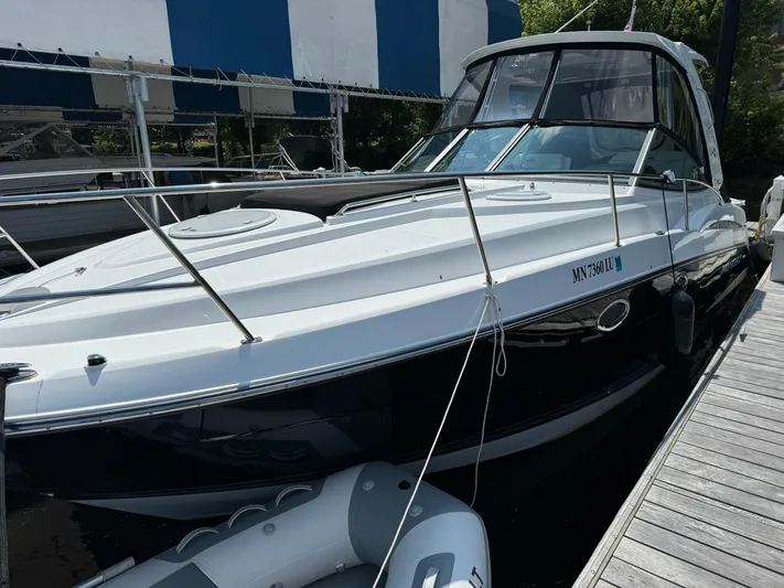 Yacht Photos Pics 2019 Monterey 335 SY boat docked at marina, featuring sleek design and modern amenities.