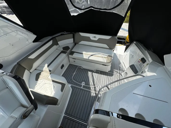  Yacht Photos Pics 2019 Monterey 335 SY boat interior with cushioned seating and sleek design.
