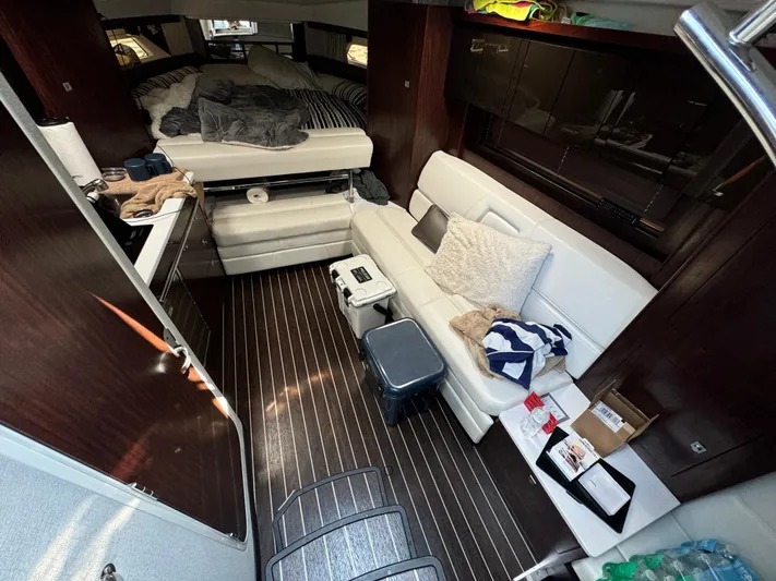  Yacht Photos Pics Interior of a 2019 Monterey 335 SY yacht with cozy seating and modern amenities.