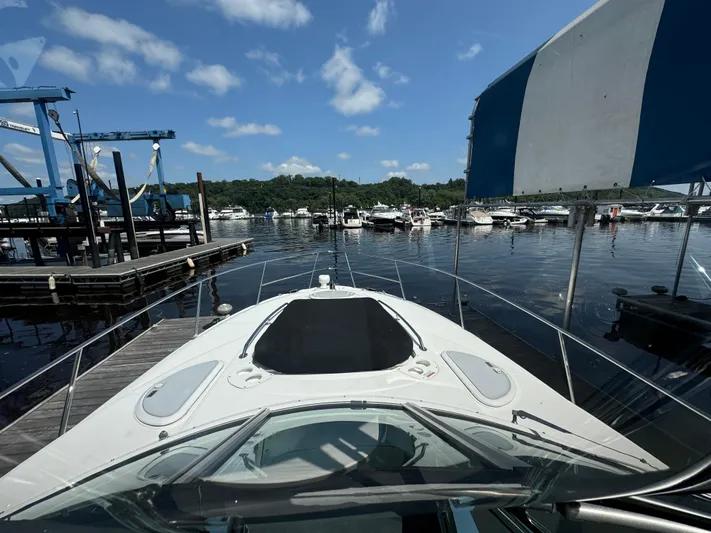  Yacht Photos Pics 2019 Monterey 335 SY boat docked at a marina under a clear blue sky.