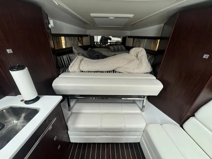  Yacht Photos Pics Interior of 2019 Monterey 335 SY yacht with cozy bed and modern amenities.