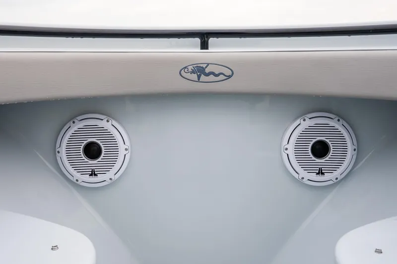  Yacht Photos Pics 2023 Valhalla Boatworks V-33 speakers with logo detail on the boat's interior.