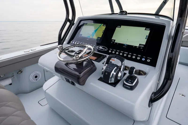  Yacht Photos Pics 2023 Valhalla Boatworks V-33 helm with advanced navigation displays and controls.