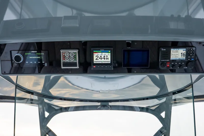  Yacht Photos Pics 2023 Valhalla Boatworks V-33 dashboard with advanced navigation and communication systems.