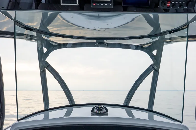  Yacht Photos Pics 2023 Valhalla Boatworks V-33 helm view with ocean horizon in background.