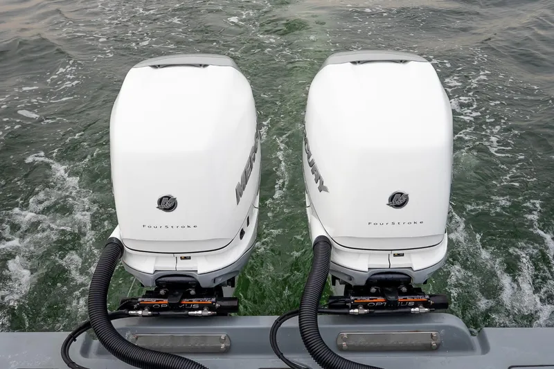  Yacht Photos Pics Twin Mercury FourStroke engines on 2023 Valhalla Boatworks V-33, cruising through water.