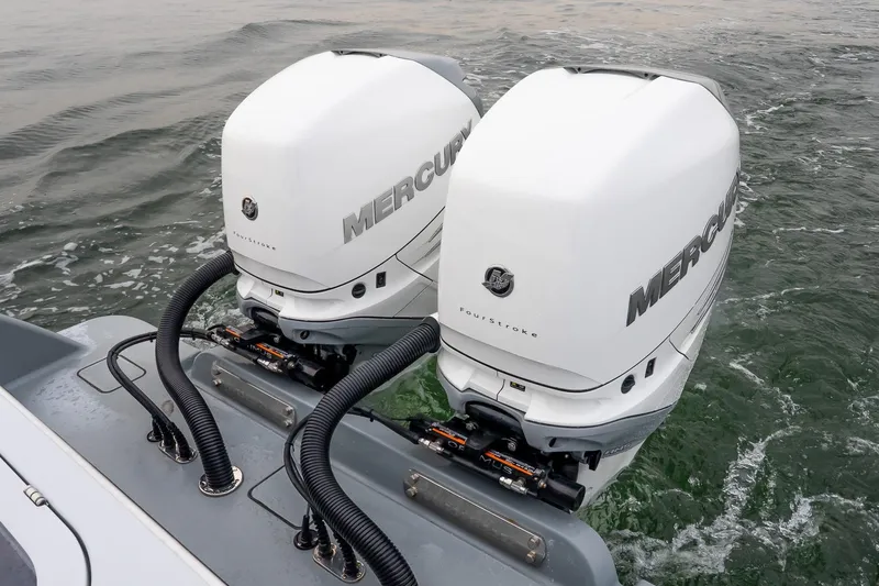  Yacht Photos Pics 2023 Valhalla Boatworks V-33 with twin Mercury outboard engines on water.