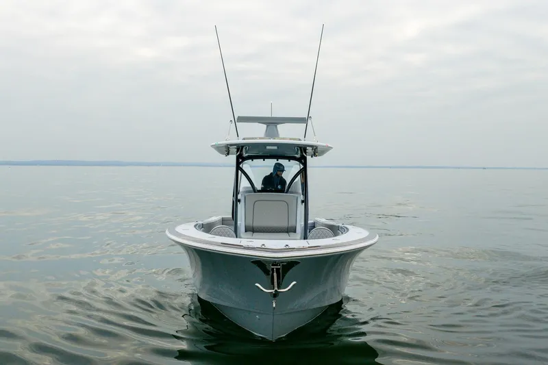  Yacht Photos Pics 2023 Valhalla Boatworks V-33 on calm water, front view.