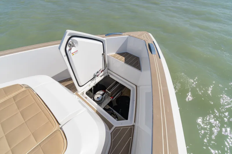 Scouser Yacht Photos Pics 2025 Pardo Yachts P38R storage compartment open on deck, near water.