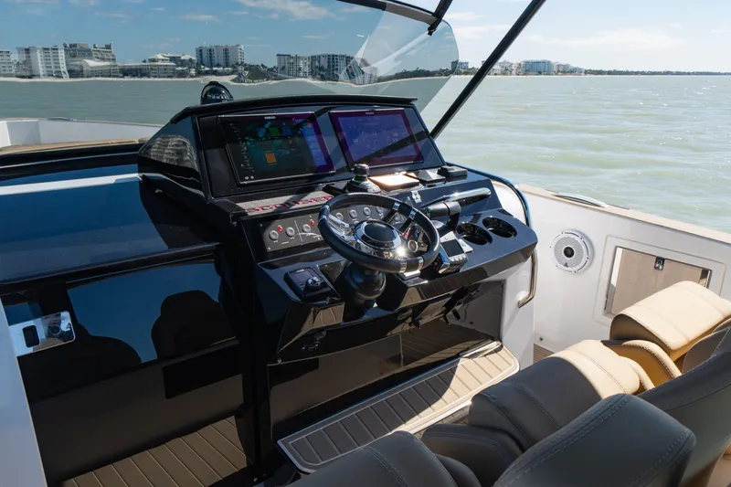 Scouser Yacht Photos Pics 2025 Pardo Yachts P38R helm with modern navigation systems and luxurious seating.