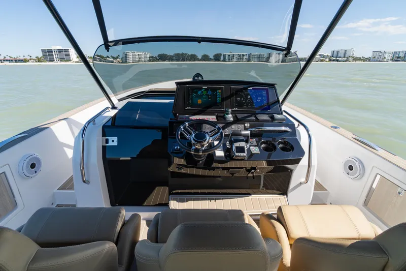 Scouser Yacht Photos Pics 2025 Pardo Yachts P38R cockpit with modern navigation system and luxurious seating.