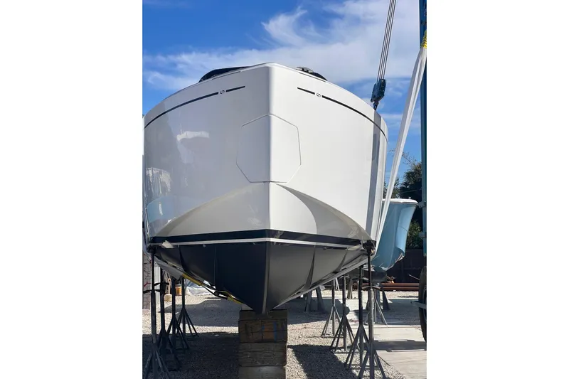 Scouser Yacht Photos Pics 2025 Pardo Yachts P38R on dry dock, showcasing sleek hull design.