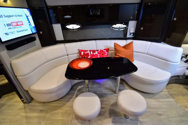 Nauti Dog II Yacht Photos Pics Luxurious interior of 2021 Formula 40 PC yacht with white leather seating and modern decor.