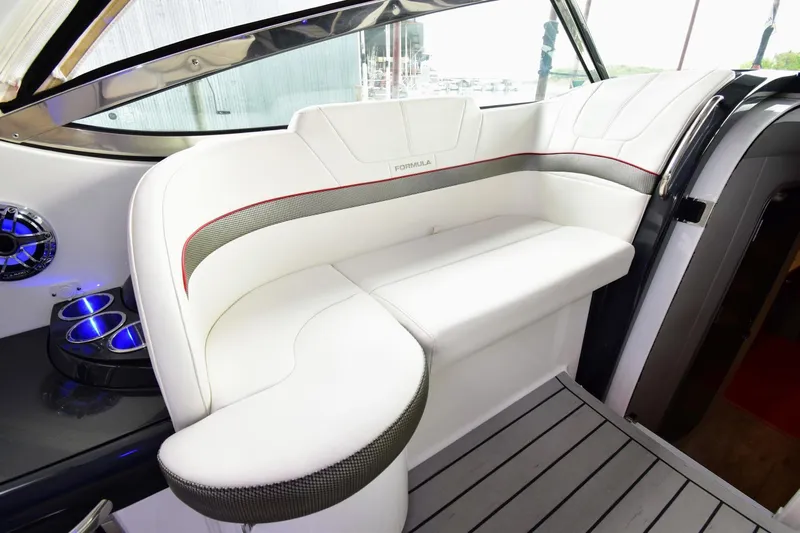 Nauti Dog II Yacht Photos Pics Luxurious seating area on a 2021 Formula 40 PC yacht with modern design.