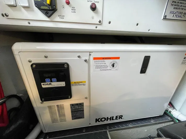 Nauti Dog II Yacht Photos Pics Kohler generator in a 2021 Formula 40 PC boat engine room.