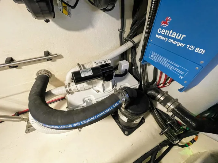 Nauti Dog II Yacht Photos Pics Engine room of a 2021 Formula 40 PC with Centaur battery charger.
