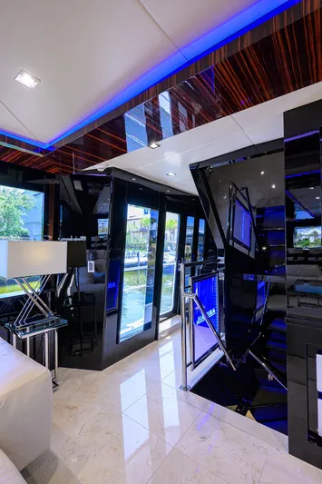  Yacht Photos Pics Luxurious interior of 1997 Broward 108 Raised Pilothouse yacht with modern decor.