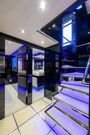  Yacht Photos Pics Luxurious interior of 1997 Broward 108 Raised Pilothouse yacht with modern lighting and sleek design.