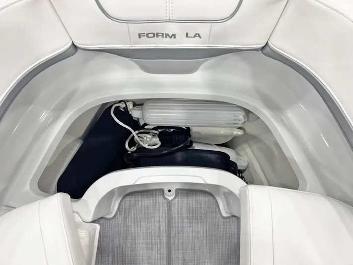  Yacht Photos Pics 2013 Formula 290 Bowrider storage compartment with fender and ropes.