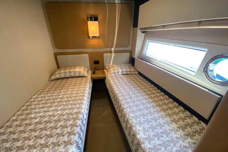  Yacht Photos Pics Interior of 2016 Azimut 77S yacht with twin beds and modern decor.