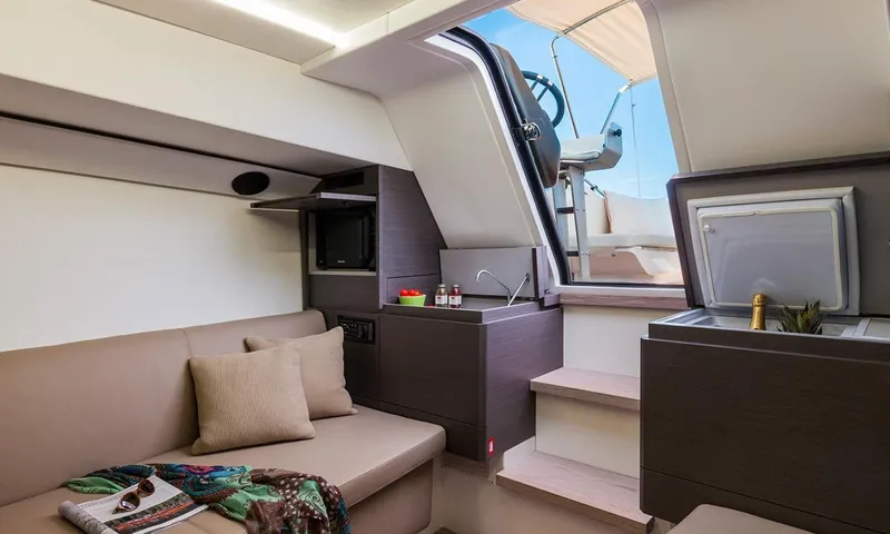  Yacht Photos Pics Interior of 2016 Wider 32 yacht with cozy seating and modern amenities.