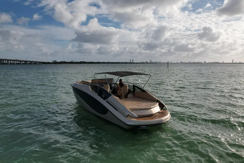  Yacht Photos Pics Wider 32 boat from 2016 on open water under a cloudy sky.