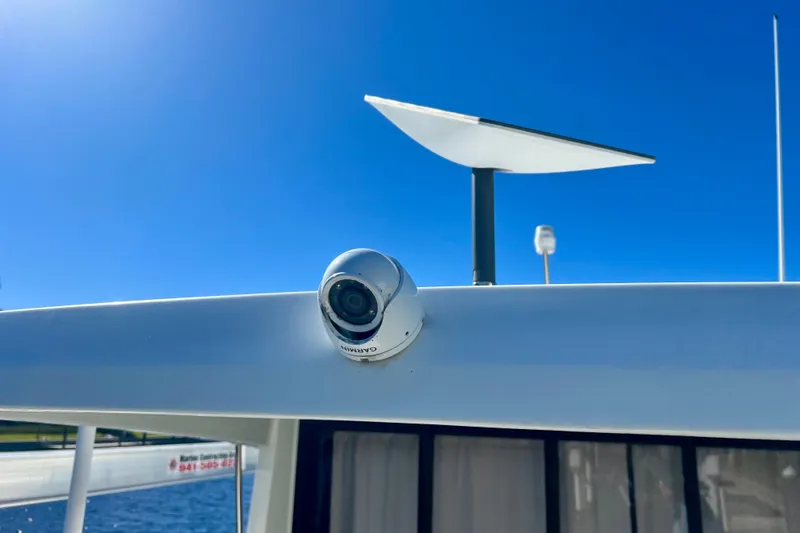  Yacht Photos Pics 2024 Beneteau Antares 11 with Garmin camera and radar, under clear blue sky.