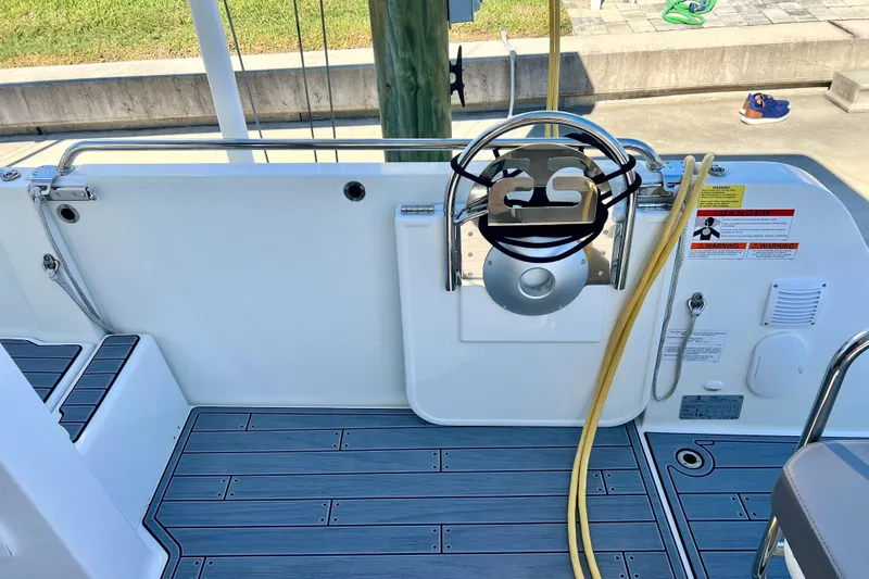  Yacht Photos Pics 2024 Beneteau Antares 11 boat deck with safety features and modern design.