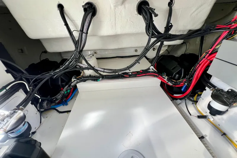  Yacht Photos Pics 2024 Beneteau Antares 11 engine compartment with wiring and components.