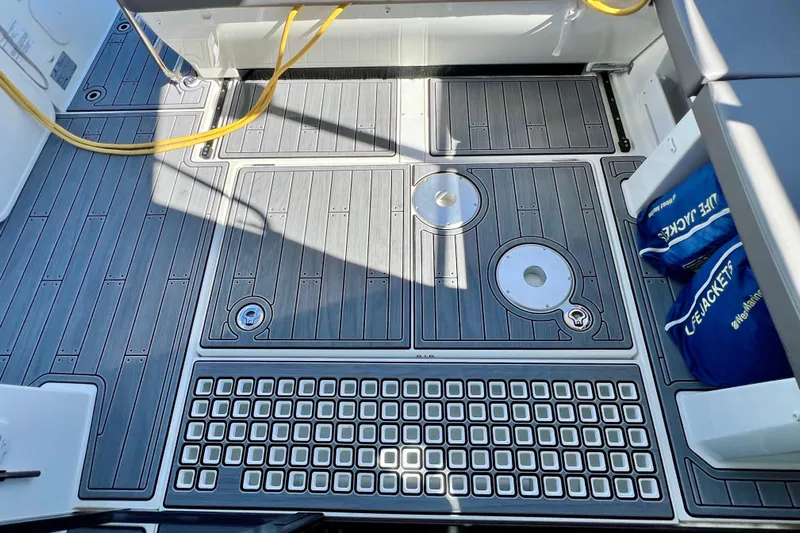  Yacht Photos Pics 2024 Beneteau Antares 11 deck with modern design and safety equipment.