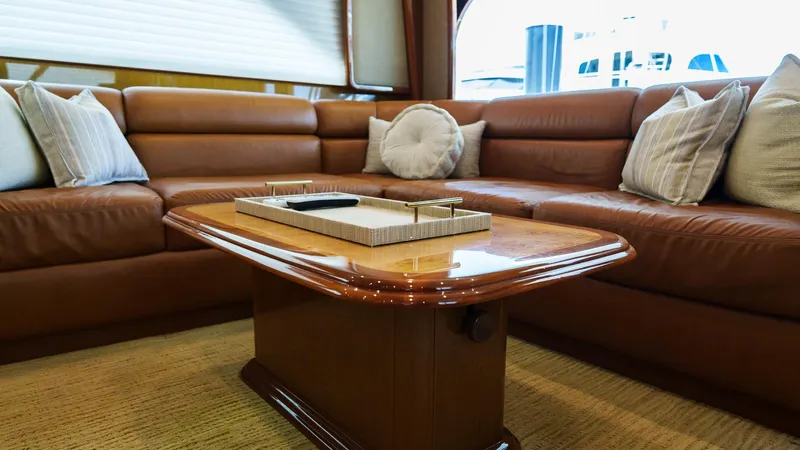 Benedetta Yacht Photos Pics Luxurious leather seating in 2012 Viking 70 Enclosed Bridge yacht interior.