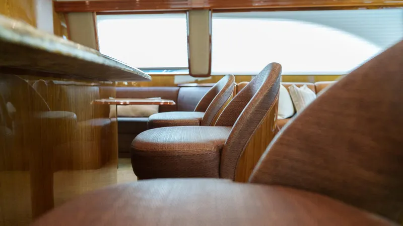 Benedetta Yacht Photos Pics Luxurious interior seating of 2012 Viking 70 Enclosed Bridge yacht.