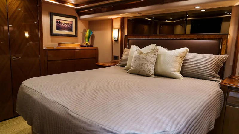 Benedetta Yacht Photos Pics Luxurious bedroom interior of 2012 Viking 70 Enclosed Bridge yacht.