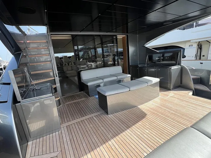  Yacht Photos Pics Luxurious 2012 Pershing 92 yacht deck with modern seating and sleek design.