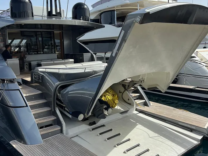  Yacht Photos Pics Luxury 2012 Pershing 92 yacht with open tender garage at marina.