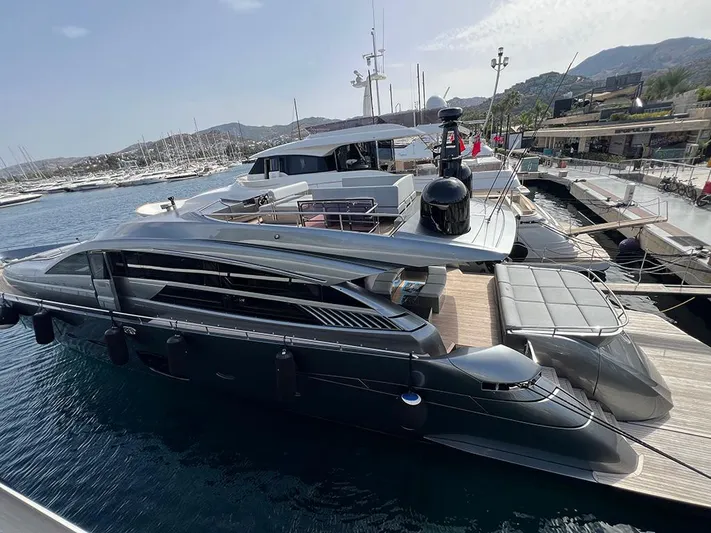  Yacht Photos Pics Luxury 2012 Pershing 92 yacht docked at marina, sleek design, modern amenities.