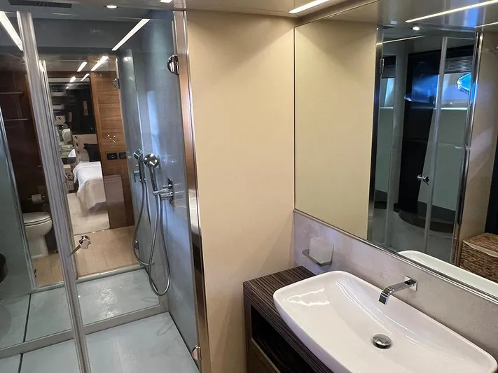  Yacht Photos Pics Luxurious bathroom interior on a 2012 Pershing 92 yacht, featuring modern fixtures and sleek design.