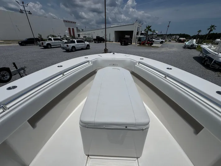  Yacht Photos Pics 2017 Invincible 33 Open Fisherman boat interior with seating, parked outdoors.