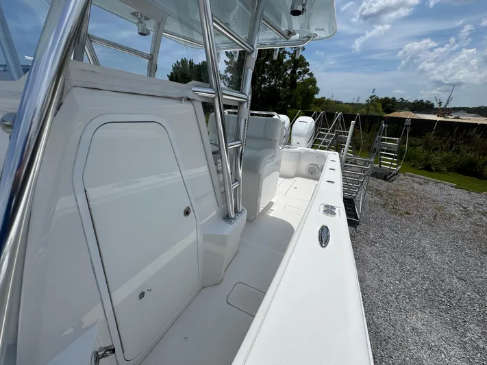  Yacht Photos Pics 2017 Invincible 33 Open Fisherman boat, sleek design, stainless steel railings, outdoor setting.