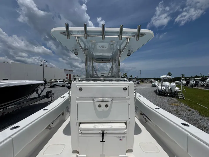  Yacht Photos Pics 2017 Invincible 33 Open Fisherman boat, center console view, under a partly cloudy sky.